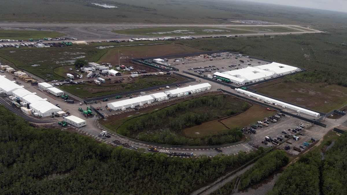Federal judge blocks Florida from further expansion of 'Alligator Alcatraz' immigration detention facility  at george magazine