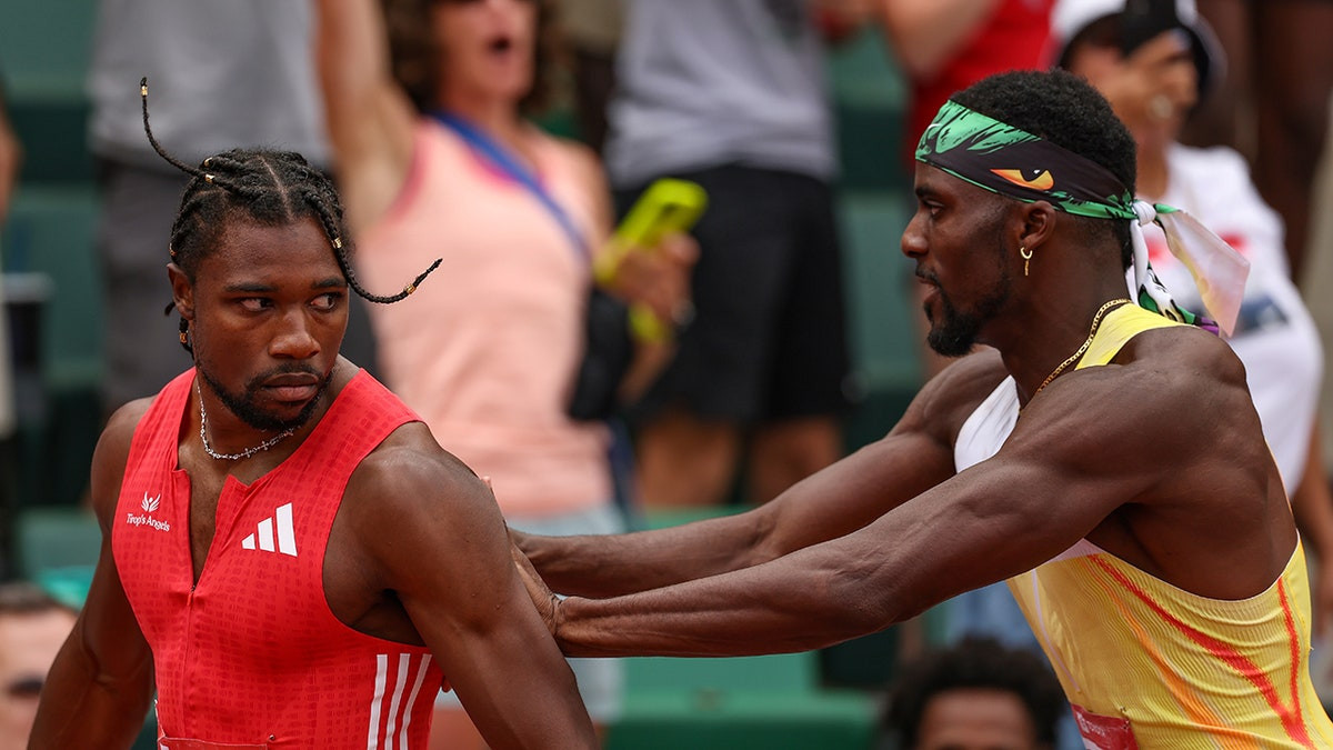 Noah Lyles stares down Olympic teammate after comeback victory, gets shoved afterward  at george magazine