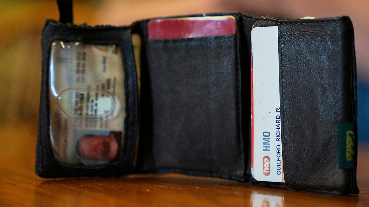 Mechanic finds Ford assembly worker's lost wallet in vehicle hood from 11 years ago  at george magazine