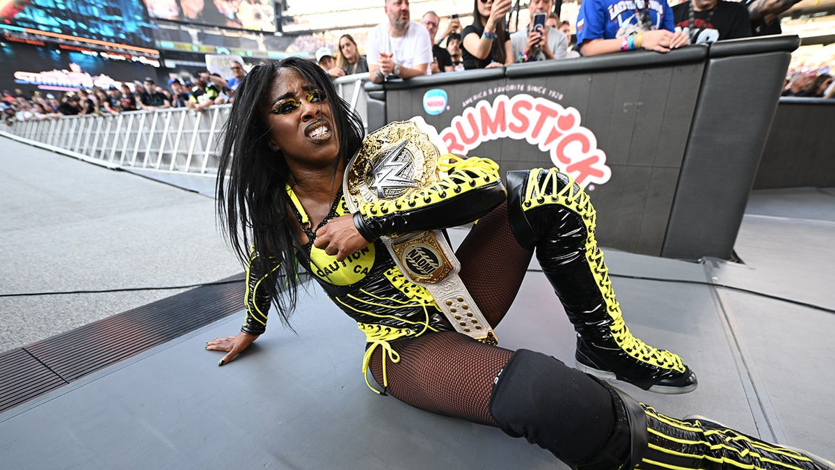 Naomi steals SummerSlam victory from Rhea Ripley, Iyo Sky to retain Women's World Championship  at george magazine