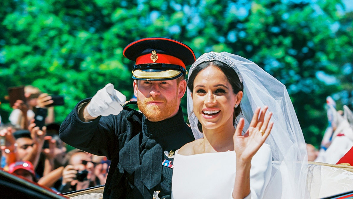 Prince Harry and Meghan Markle’s wedding day sparked profane reaction from Prince Philip: book  at george magazine