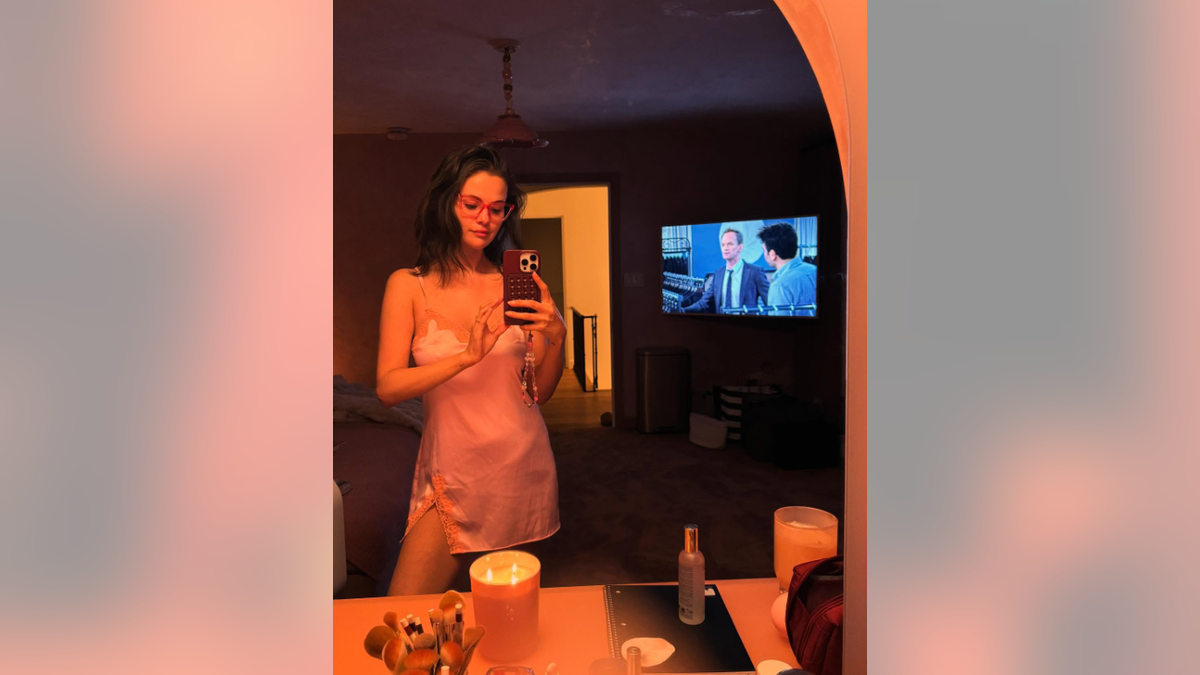 Selena Gomez wears nothing but satin lingerie in sultry selfie  at george magazine