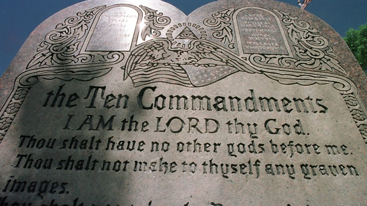 Federal judge blocks Arkansas Ten Commandments law in certain districts  at george magazine