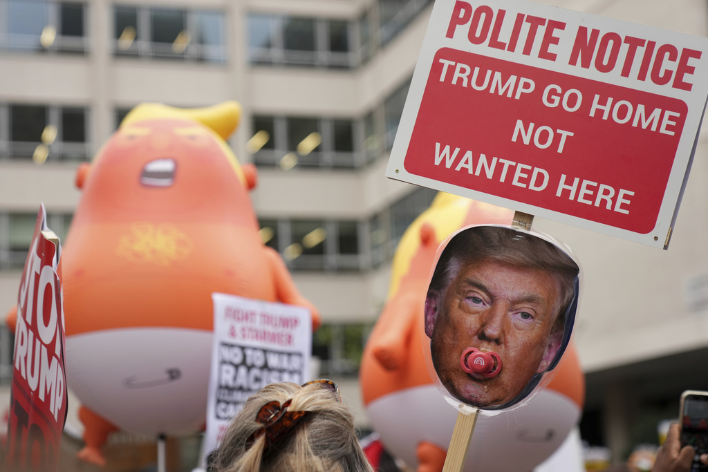 London protesters taunt Trump during UK state visit  at george magazine