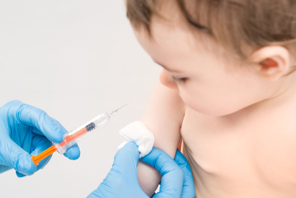FDA commissioner questions need for hepatitis B shot for newborns  at george magazine