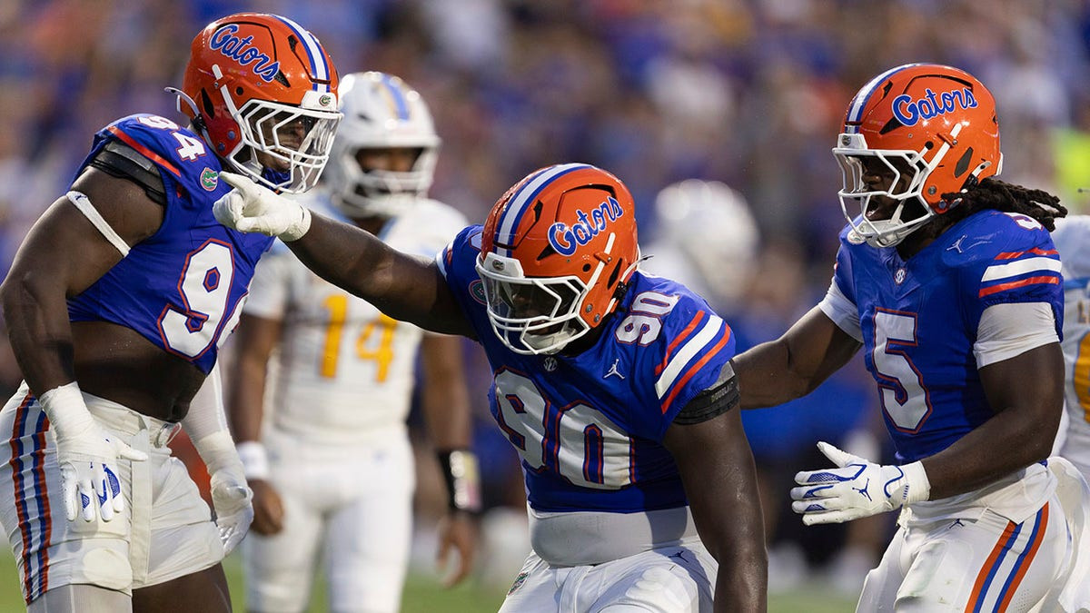 Florida defensive lineman ejected for spitting on player during opponent's game-winning drive  at george magazine