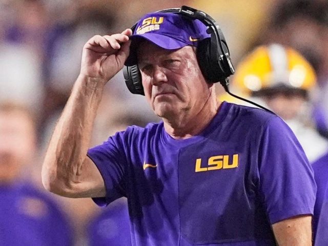 LSU, Florida players steamroll coach Brian Kelly on sidelines