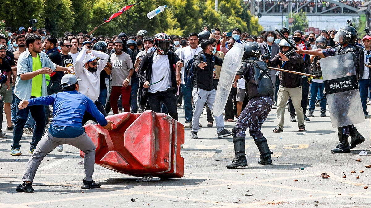 Violent Gen Z protests spiral with at least 19 killed in Nepal; video shows parliament building ablaze  at george magazine