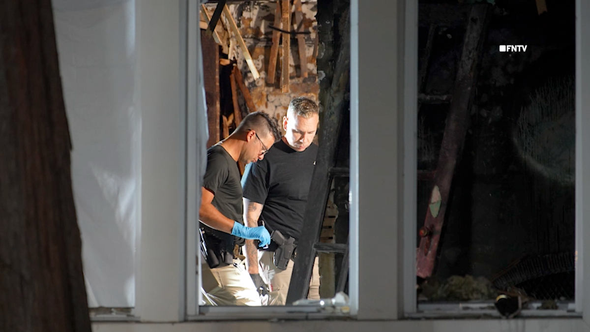 Couple found tied up and burned to death in home near famous racetrack as police hunt for suspect  at george magazine