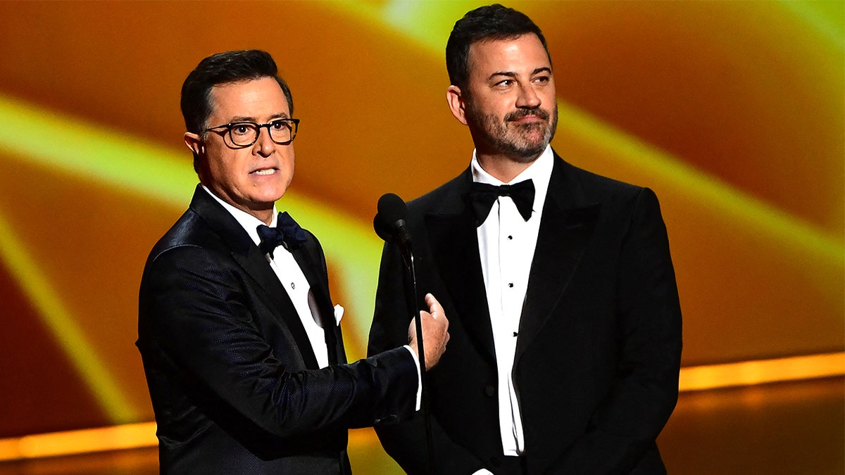 Colbert laments 'tonight we are all Jimmy Kimmel' as outgoing CBS host pays tribute to fallen ABC colleague  at george magazine