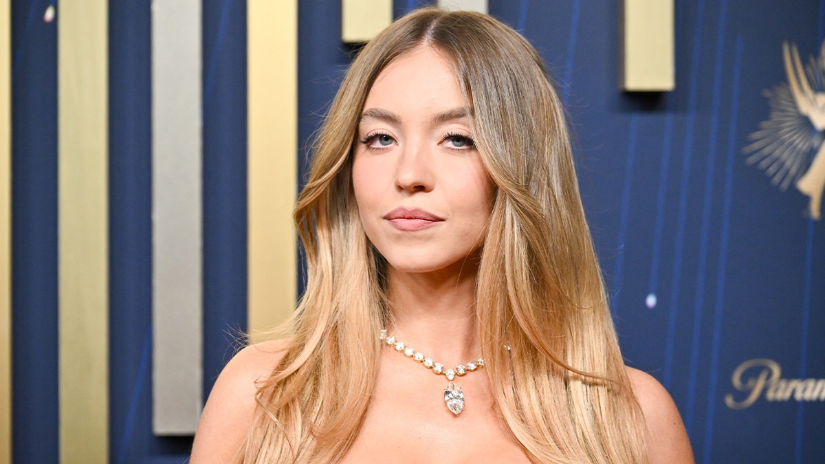 Sydney Sweeney slips into swimsuits for birthday 'trip to mars'  at george magazine