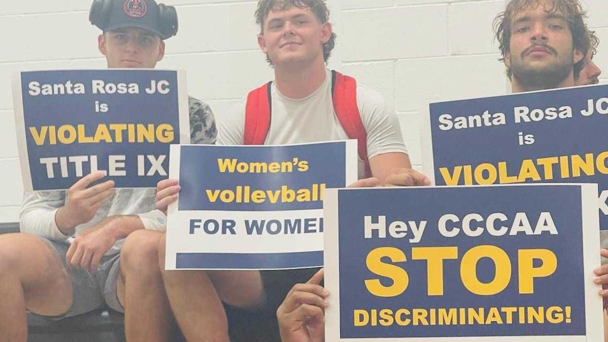 College women's volleyball game featuring trans athlete draws crowd of protesters in California  at george magazine