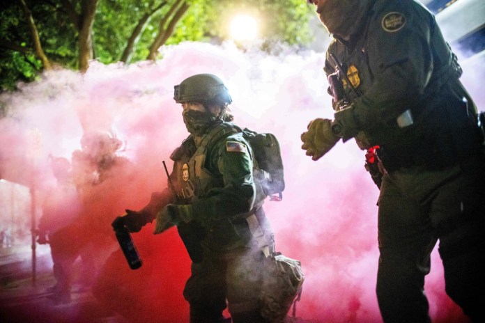 Trump open to invoking Insurrection Act following Illinois and Oregon troop deployments  at george magazine