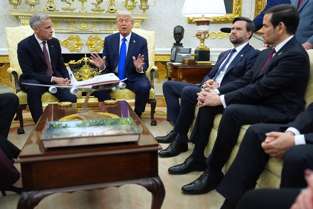 Trump hints at auto tariff relief for American and Canadian companies  at george magazine