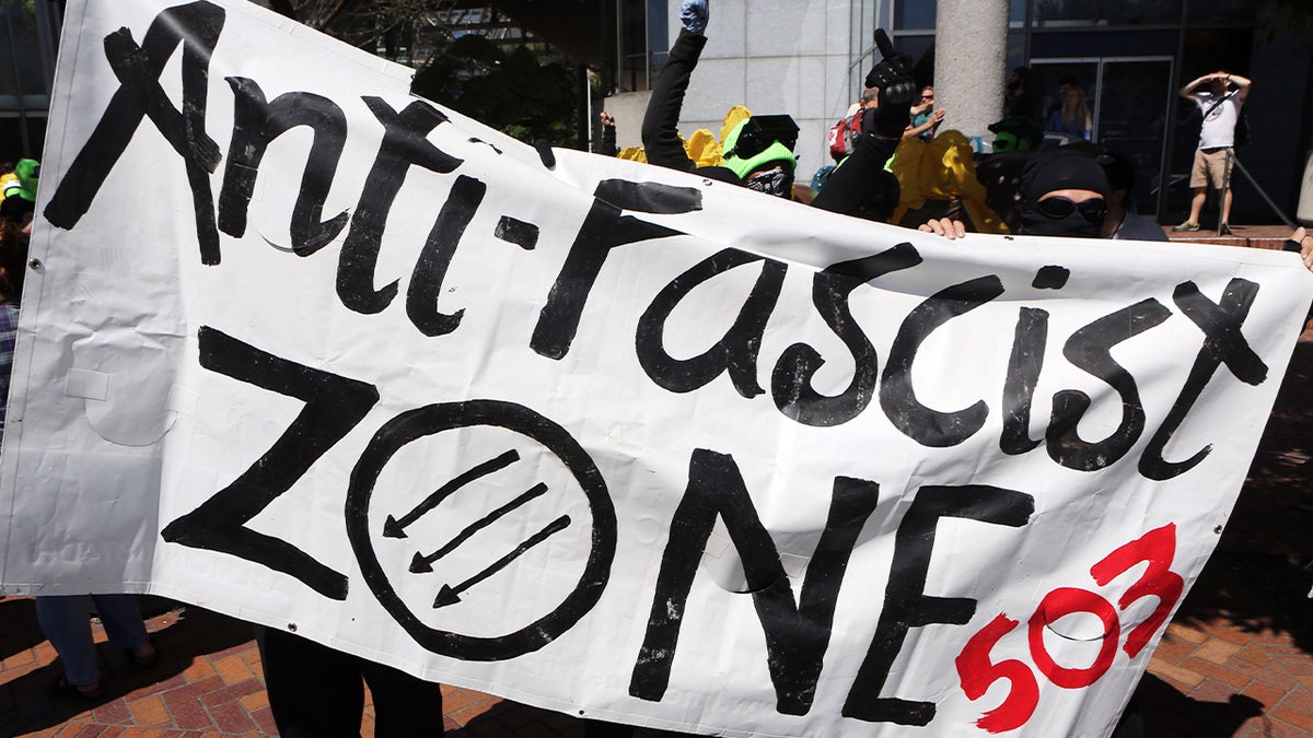Rutgers student government demands university defend Antifa-aligned professor who fled country  at george magazine