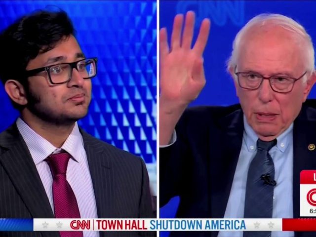 Bernie Sanders clashes with town hall attendee over Schumer leadership during shutdown
