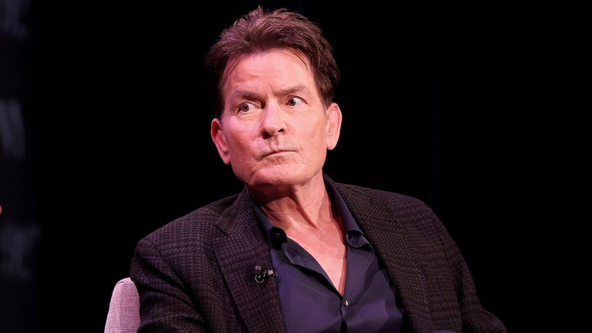 Charlie Sheen opens up about feeling excluded during brother Emilio Estevez's Brat Pack era  at george magazine