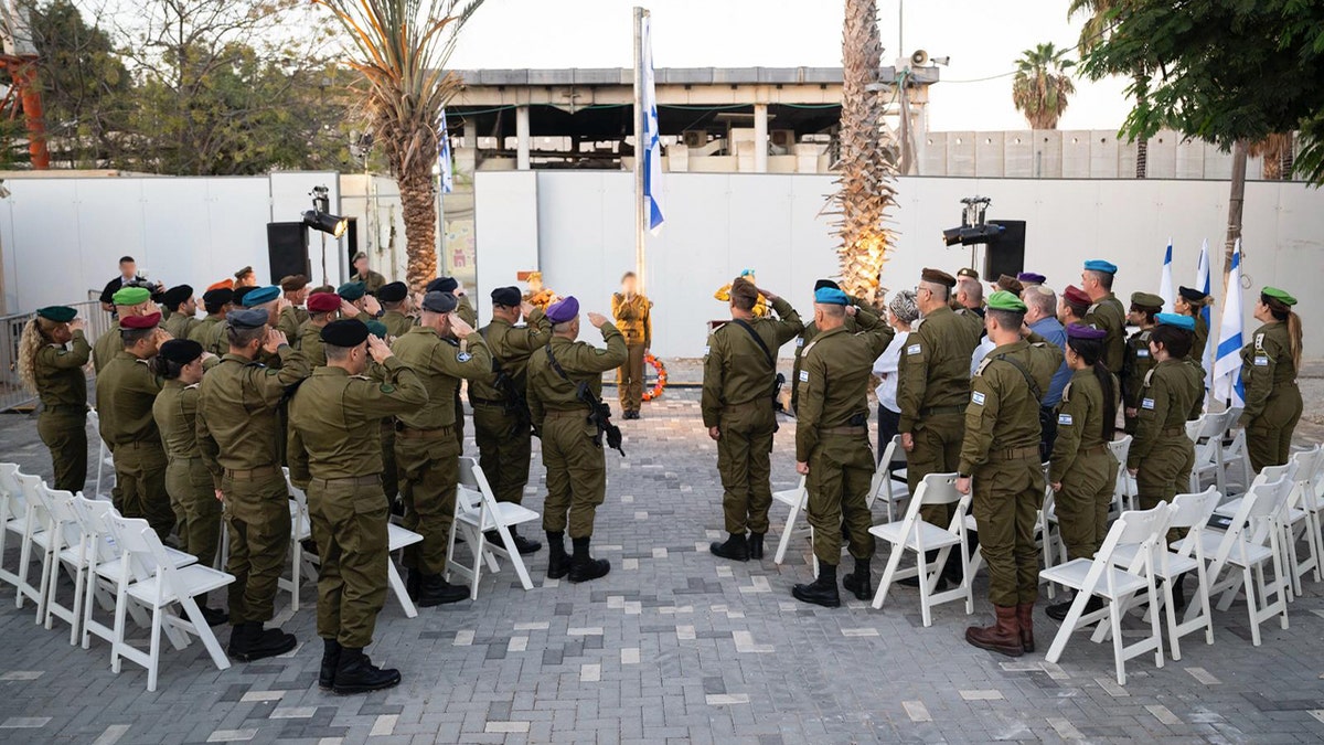 IDF holds memorial ceremony at base attacked by Hamas on Oct. 7 honoring fallen troops  at george magazine