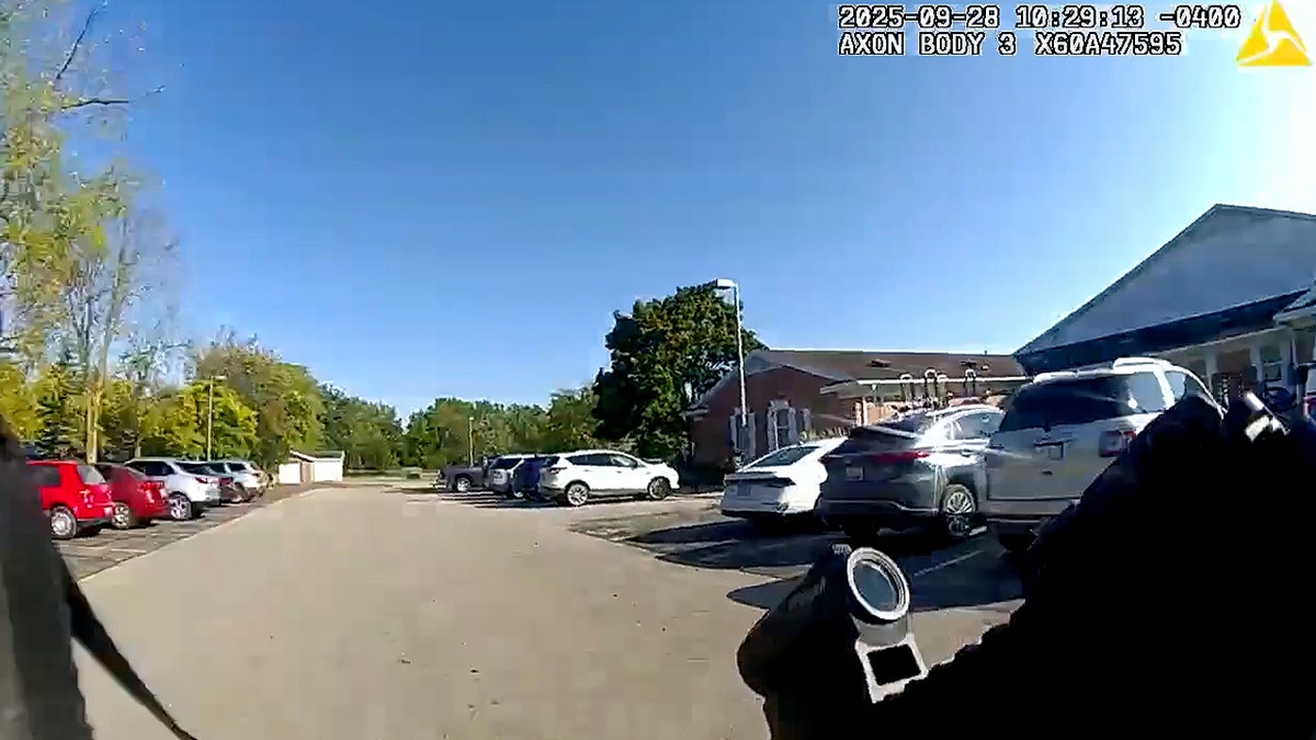 Michigan church shooting bodycam video shows police confront gunman  at george magazine