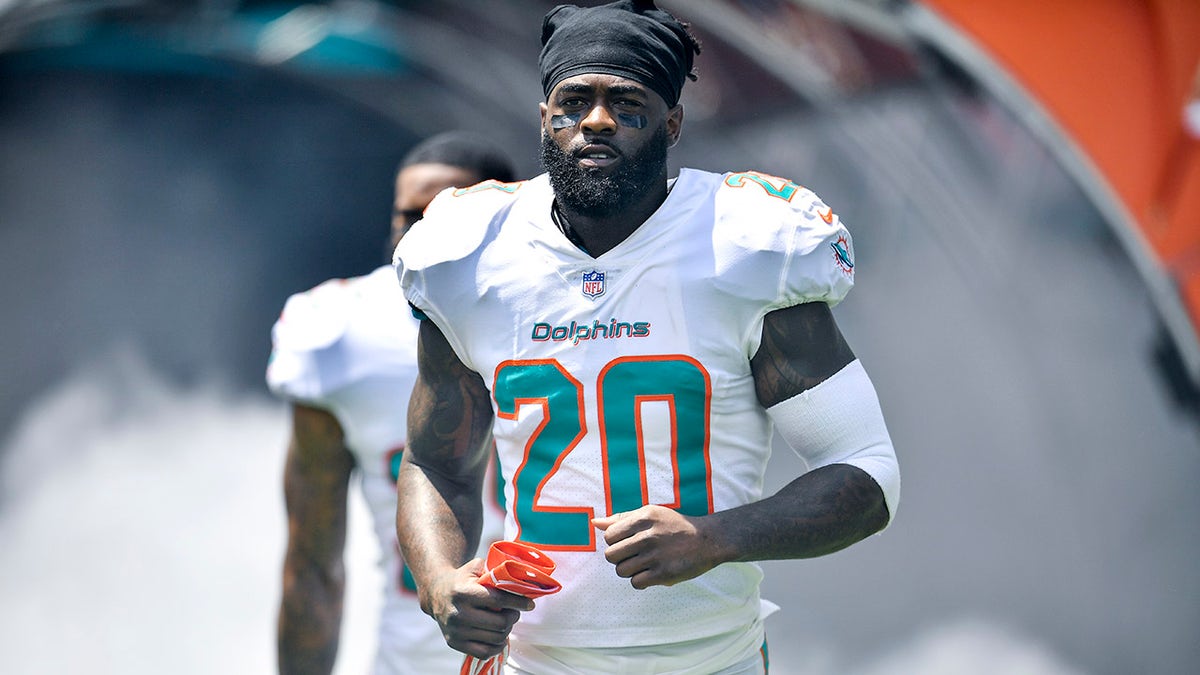 Former Dolphins player Reshad Jones awarded settlement in fraud case  at george magazine