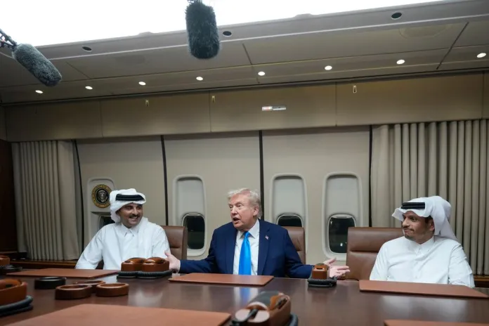 Emir of Qatar joins Trump on Air Force One during trip to Asia  at george magazine