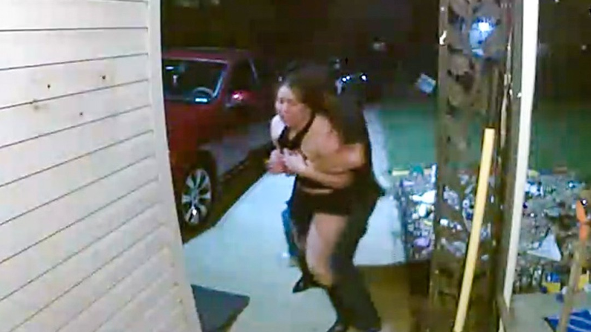 Police release major update after viral video shows screaming woman being pulled from doorway  at george magazine