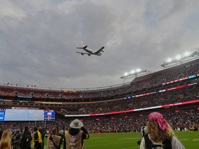 Air Force One conducts flyover of Commanders-Lions game as Trump makes history