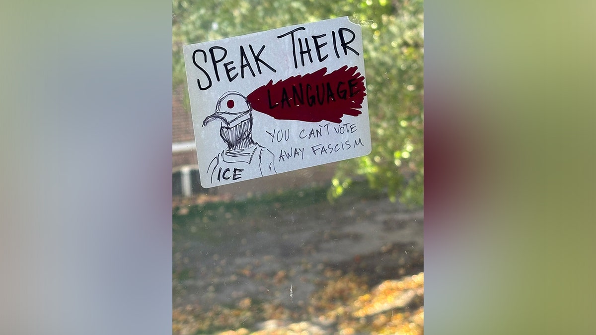 Graphic anti-ICE imagery at University of Wisconsin shows agent with bullet in head: 'Speak their language' at george magazine