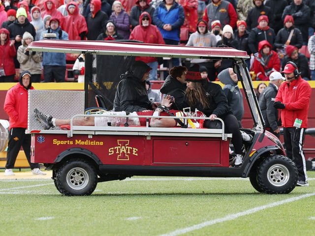 Iowa State player carted off, hospitalized after collapsing to field from brutal hit