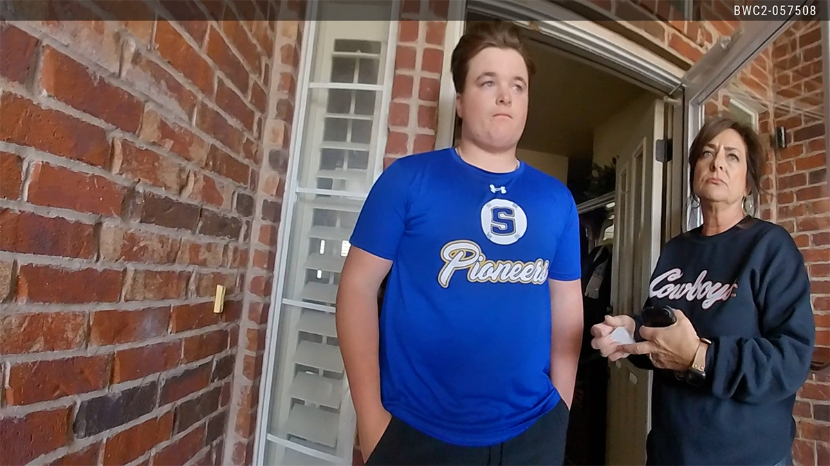 Newly released video shows cops cuffing teen linked to violent sex assault scandal that has families fuming  at george magazine