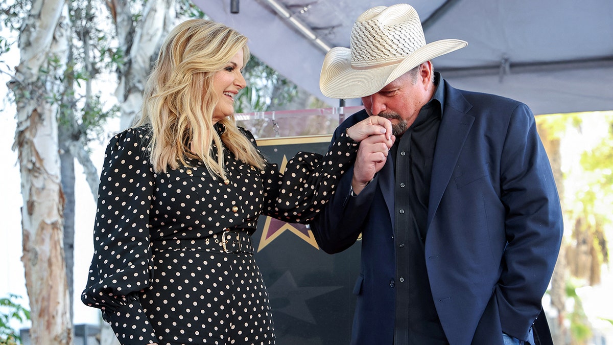Trisha Yearwood explains what made her step away from the spotlight after marrying Garth Brooks  at george magazine
