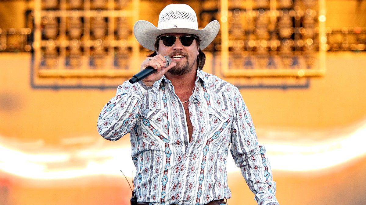 Country star Gavin Adcock falls off stage during concert  at george magazine