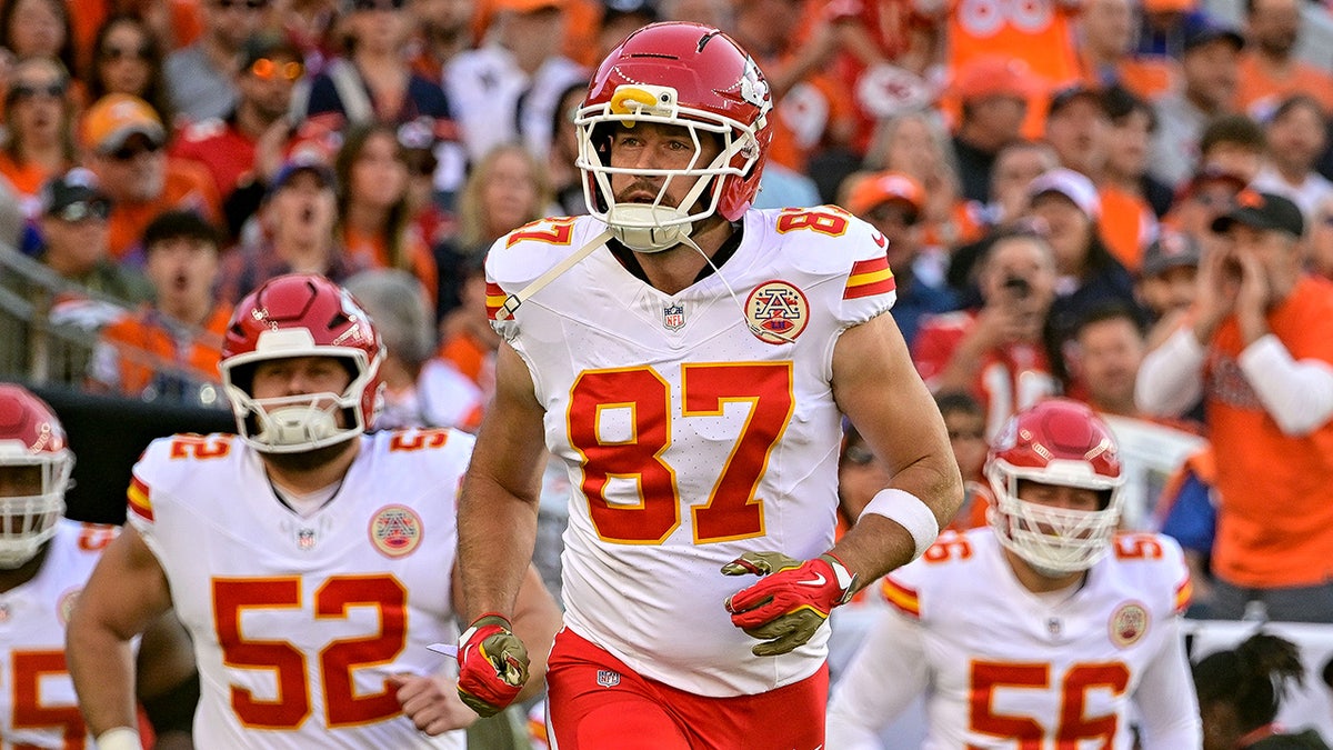 Chiefs' Travis Kelce has words with Broncos defender during pivotal divisional matchup at george magazine