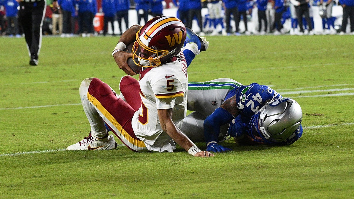Commanders' Jayden Daniels suffers gruesome arm injury in loss to Seahawks  at george magazine