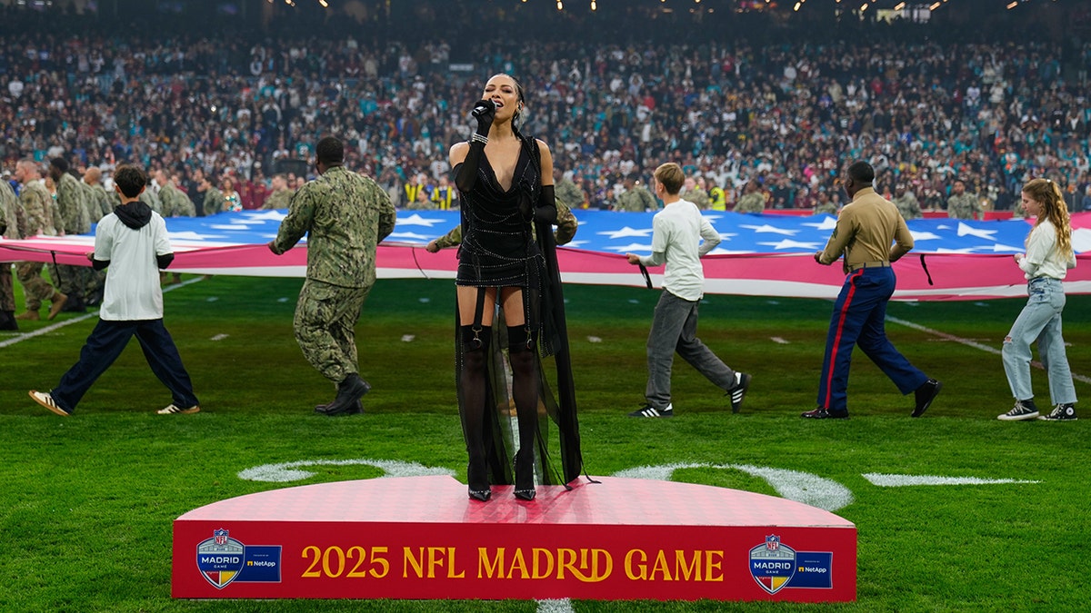 US national anthem singer for NFL's Spain game sparks debate over outfit choice at george magazine