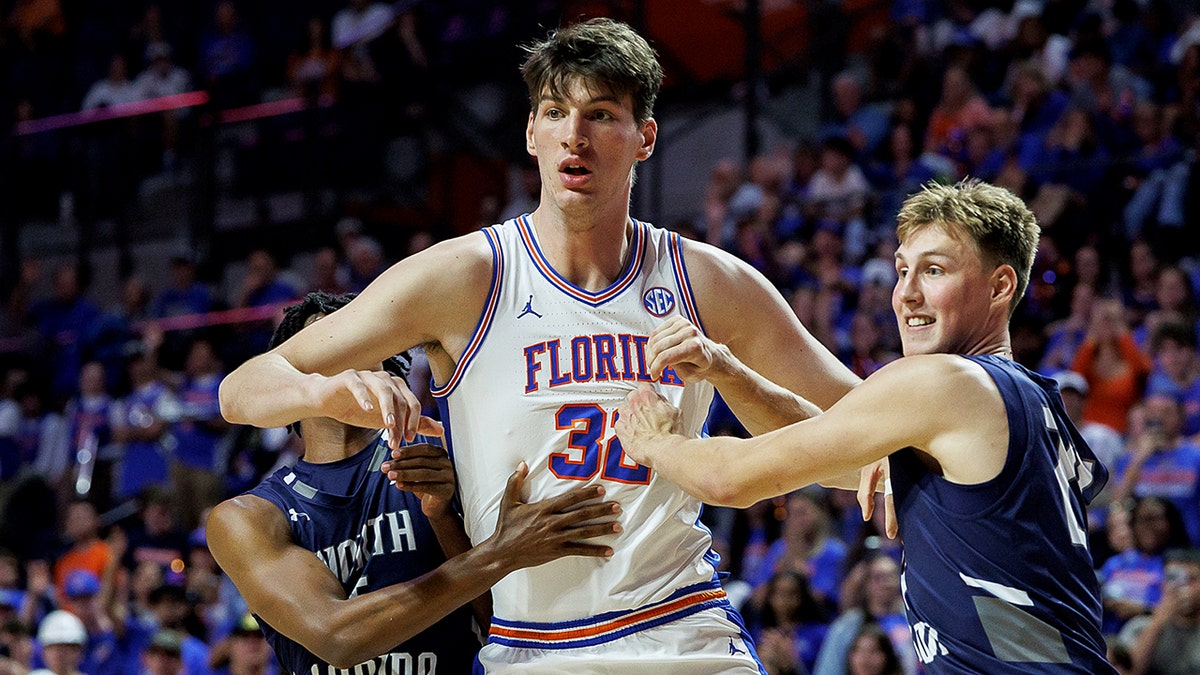 World's tallest teenager Olivier Rioux makes collegiate basketball history for Florida Gators at george magazine
