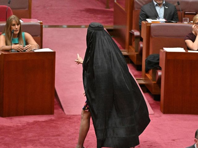 Australian senator wears burqa after move to block her face-covering ban bill