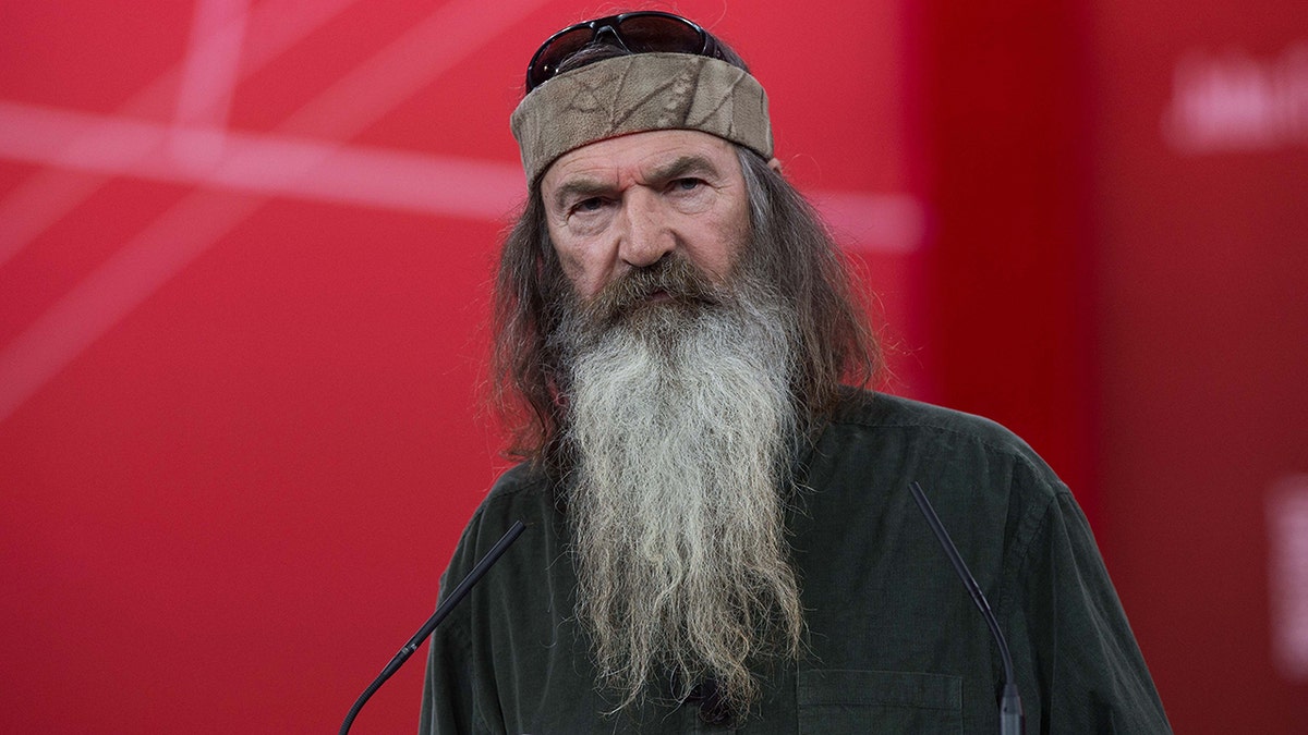'Duck Dynasty' star Phil Robertson's household ban on country music baffled his sons at george magazine
