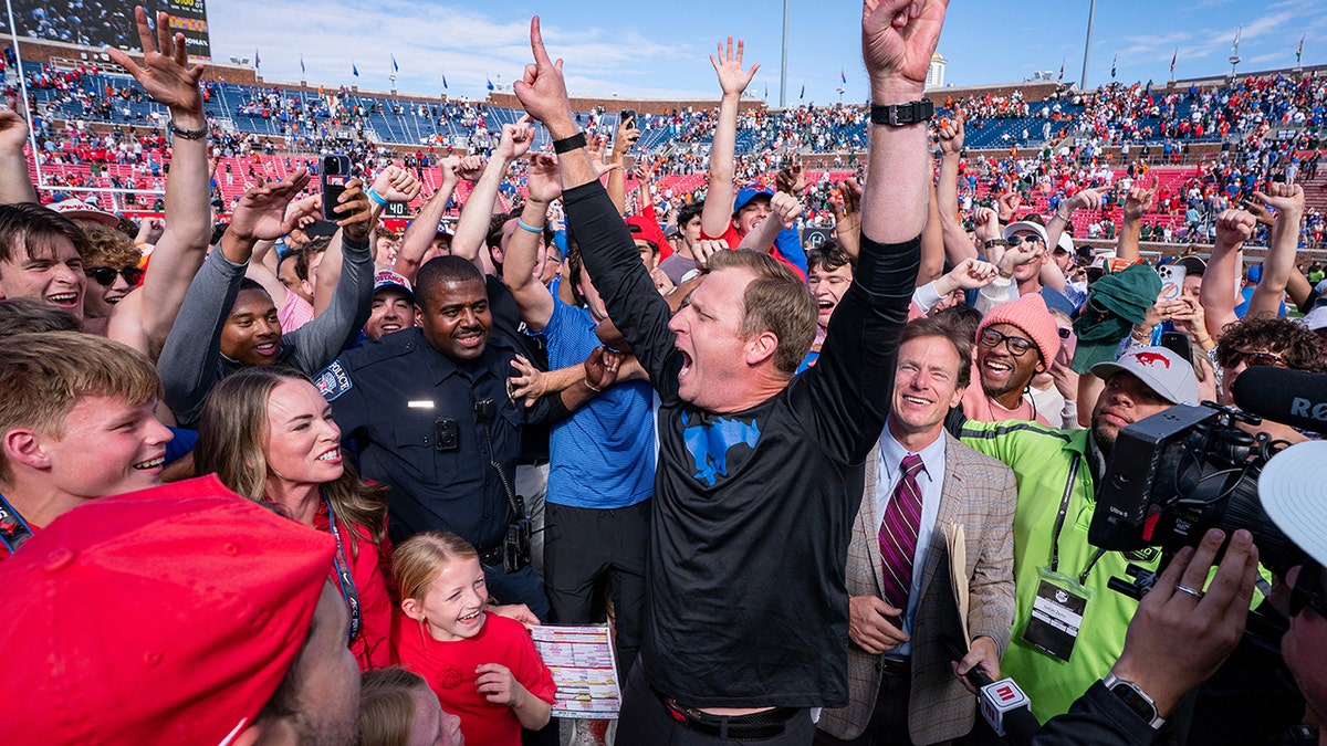 SMU stuns No 10 Miami in overtime after quarterback Carson Beck throws goal-line interception  at george magazine