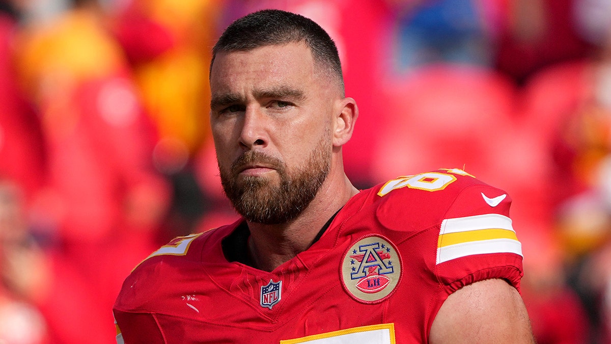 Travis Kelce's dad fires back at son's critics with social media post at george magazine