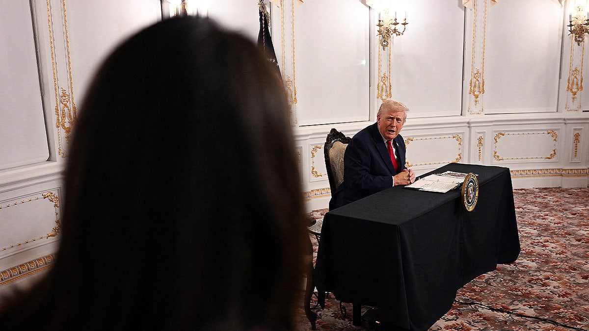 Trump calls reporter a ‘stupid person’ during tense exchange about National Guardsmen murder suspect  at george magazine