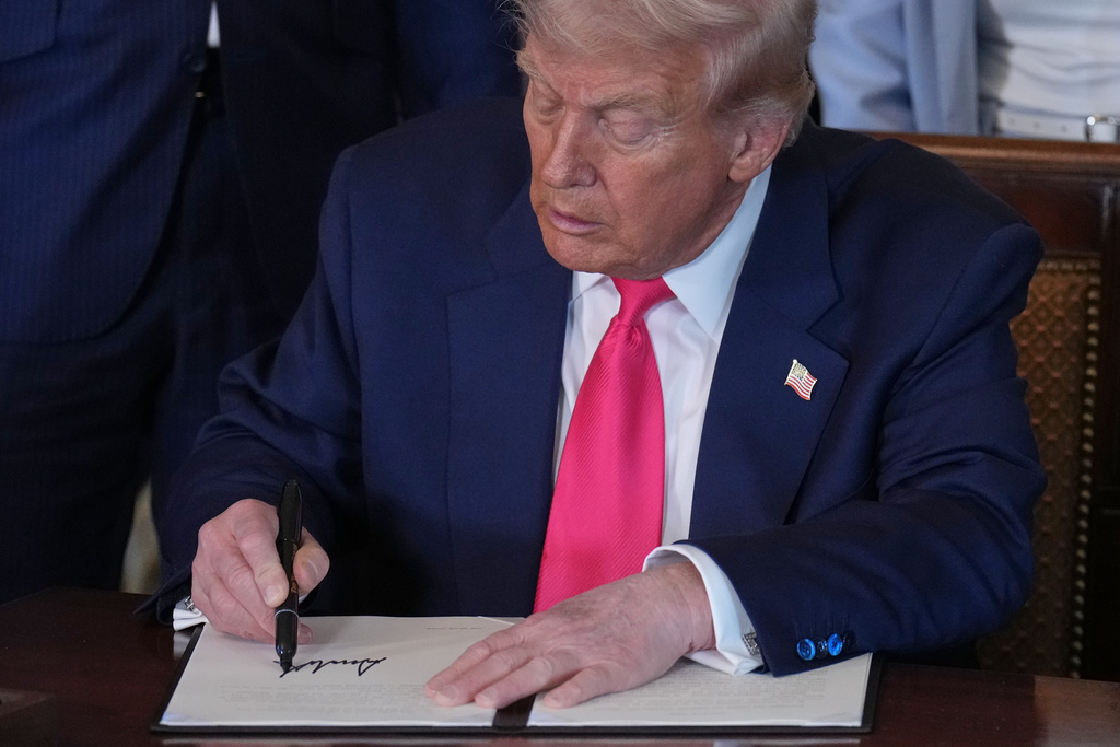 WATCH LIVE: Trump signs executive order from White House at george magazine