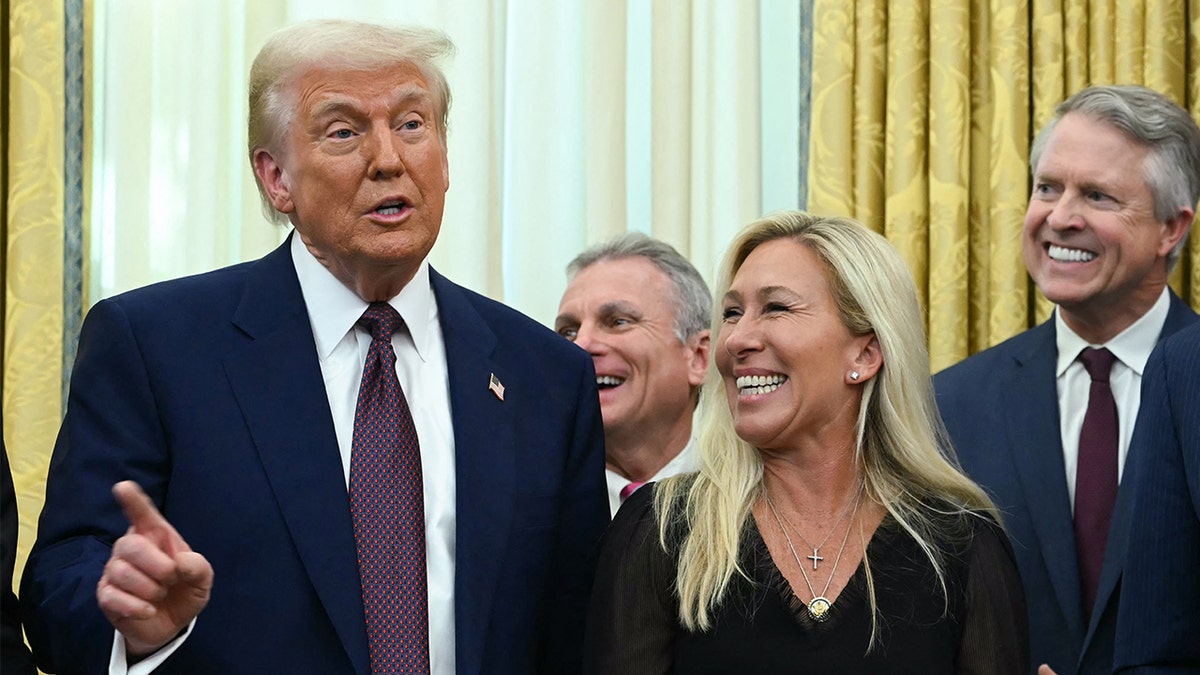 Trump says he'd 'love to see' Greene return to politics despite recent attacks  at george magazine