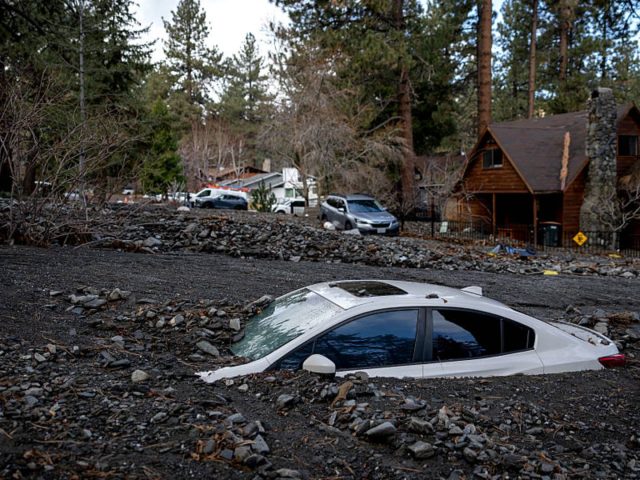 Rain-soaked California still at risk of floods and high surf