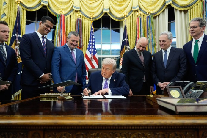 Trump signs executive order limiting state regulation of AI  at george magazine