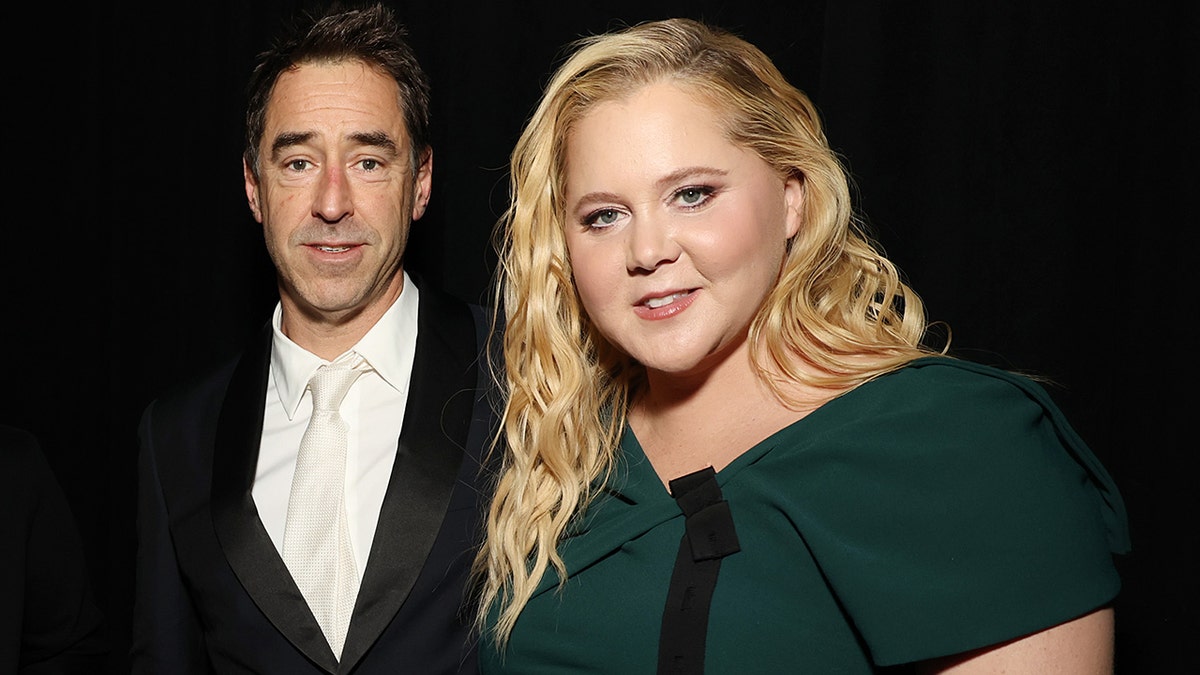 Amy Schumer announces split, says not because she 'dropped some lbs' and he can 'still pull some hot tail' at george magazine