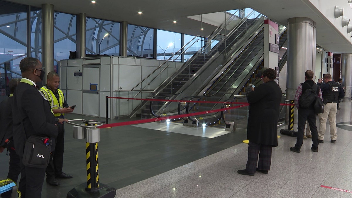 Man rushed to hospital in apparent self-inflicted shooting at Atlanta airport at george magazine