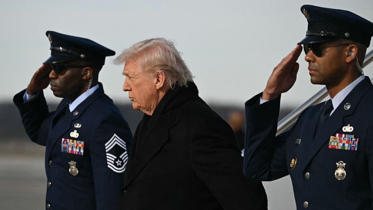 Trump attends solemn dignified transfer for Iowa guardsmen, civilian killed in Syria ISIS attack at george magazine