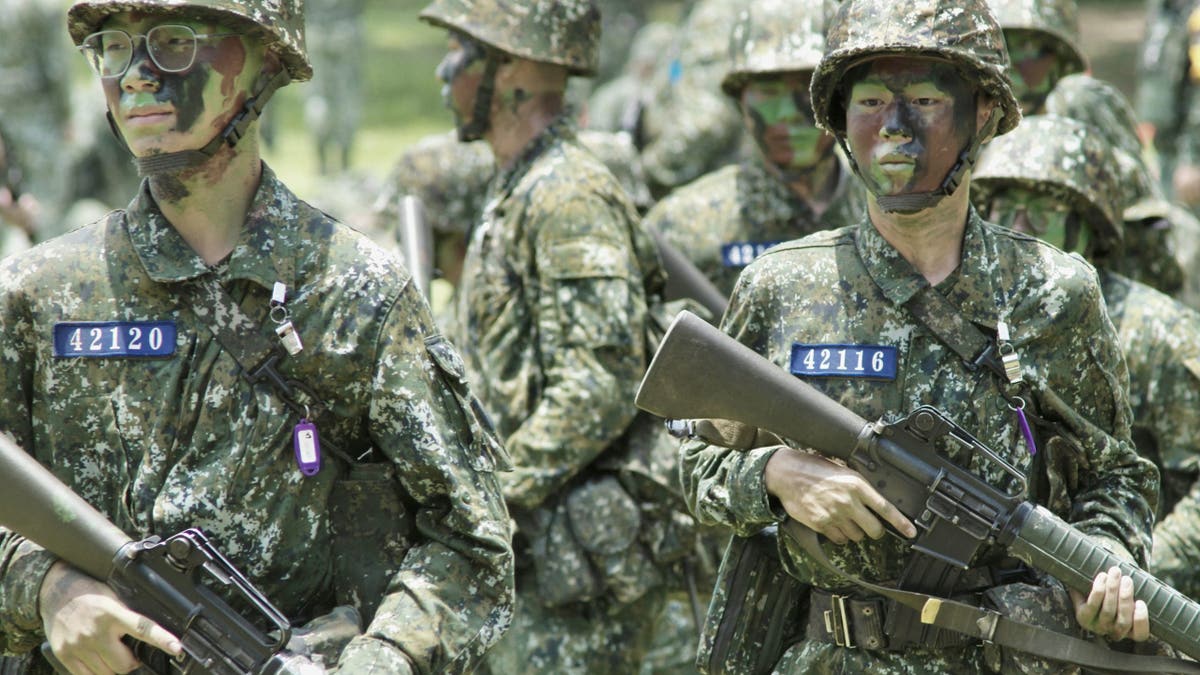 China warns of rising war risk after historic US arms sale to Taiwan at george magazine