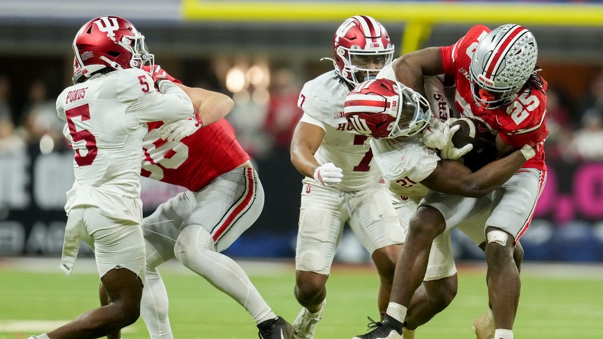 Indiana wins first outright Big 10 football title since 1945 after Ohio State flubs short field goal try at george magazine